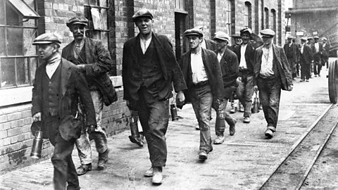 Workers returning from a coal mine in 1926.