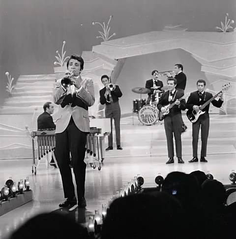 Getty Images Herb Alpert and The Tijuana Brass, pictured in 1966, when they dominated the US pop charts (Credit: Getty Images)