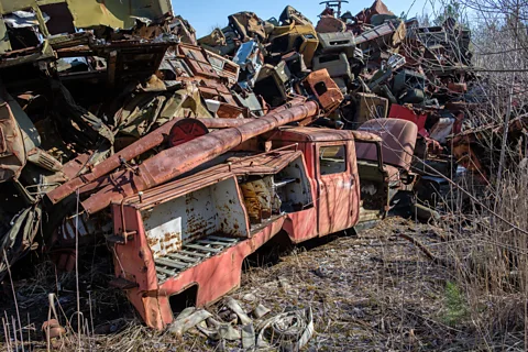 Kamil Budzynski Amid the tumult of Russia's invasion of Ukraine, the abandoned vehicles will likely spend decades decaying in the exclusion zone's vast forests (Credit: Kamil Budzynski)