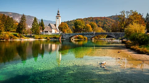 Getty Images Lake Bohinj in Slovenia offers alpine scenery and easy access to Ljunljana (Credit: Getty Images)