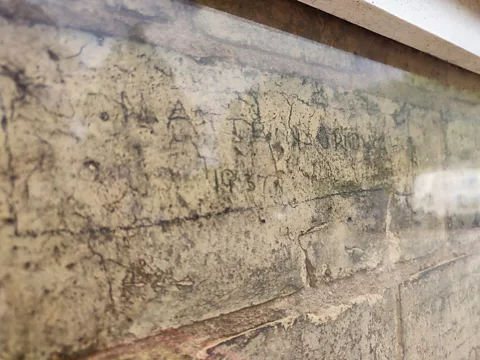 Richard Fisher Look carefully and you can make out the scrawls of the young Attenboroughs on the brickwork of their family home (Credit: Richard Fisher)