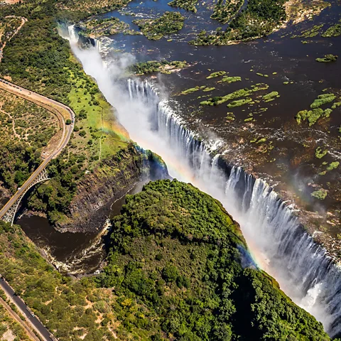 Getty Images Stretching more than 1.7km (1.05 miles) across the Zambezi River, Victoria Falls is one of the world's largest waterfalls (Credit: Getty Images)