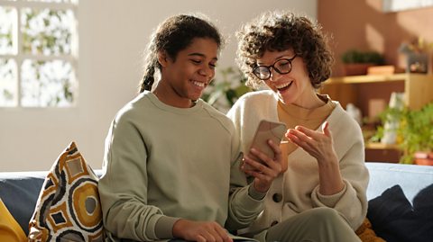 A foster parent with their foster daughter.
