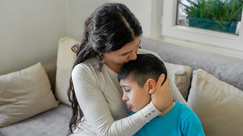 A foster parent with their foster son.