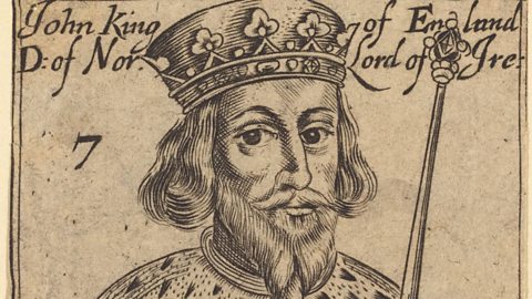 A medieval depiction of King John, who has been drawn wearing a crown, an ermine collar and regal clothes. He is holding a sceptre.