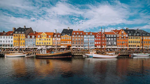 Getty Images A summer holiday no longer has to mean the beach, with travellers increasingly looking to cooler city breaks in northern Europe (Credit: Getty Images)