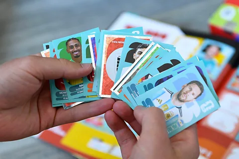 Alamy A collection of World Cup 2026 stickers fanned in someone's hands (Credit: Alamy)