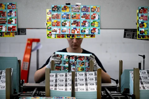 Getty Images Panini's World Cup sticker album is the largest it has ever produced, requiring fans to collect 980 different stickers (Credit: Getty Images)