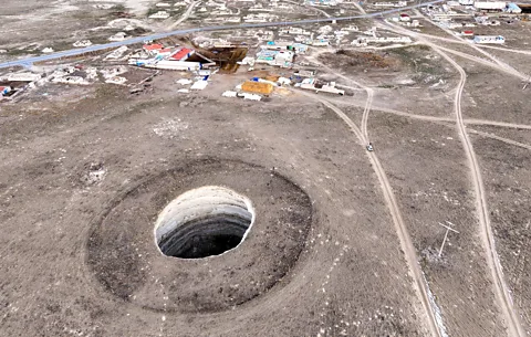 Getty Images The sinkholes have formed partly because of agricultural practices that have too rapidly depleted the underground water resources (Credit: Getty Images)