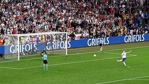 Chloe Kelly scoring the winning penalty for England against Spain in the UEFA Women's Euro 2025 final