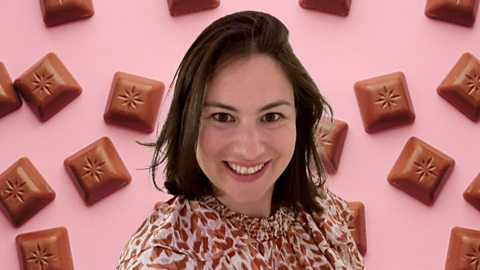 Image of Abi Freedman in front of chocolate.
