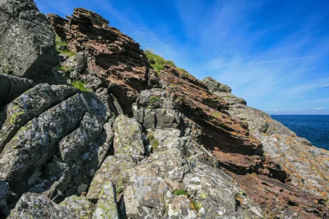 Alamy The rock formations at Siccar Point helped James Hutton develop the concept of deep geographical time (Credit: Alamy)