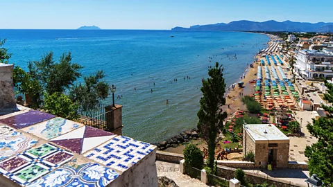 Alamy Each summer, a vibrant beach culture unfolds along the Riviera of Ulysses (Credit: Alamy)