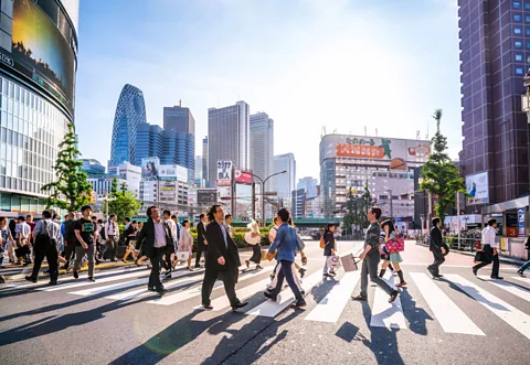 Getty Images Courtesy and consideration help keep Japan's busy cities running smoothly (Credit: Getty Images)