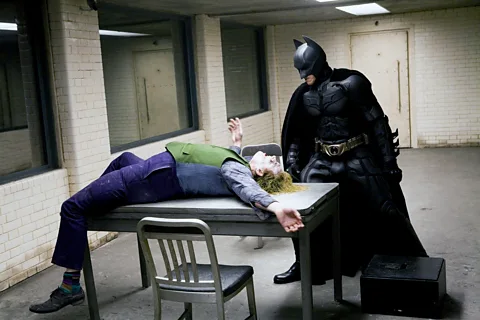 Alamy Caption: Batman films from 1989 onwards borrowed from Miller – including Christian Bale in Christopher Nolan's Dark Knight trilogy (Credit: Alamy)