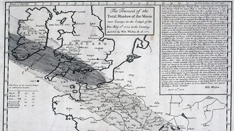 The image shows an engraving of a map from the 1720s. It shows Britain and the projected path of the Moon's shadow over it. On the right, there is a large paragraph of writing too small for us to read, that explains what the map depicts.