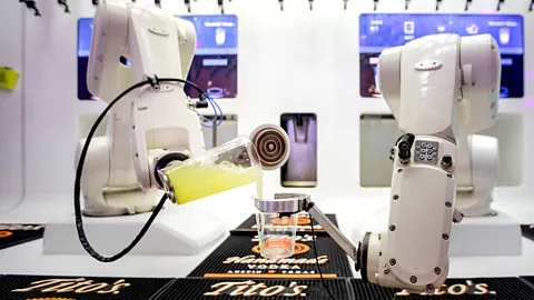 Getty Images The margaritas are ice cold at The Tipsy Robot bar, but the machines want something extra for their service (Credit: Getty Images)