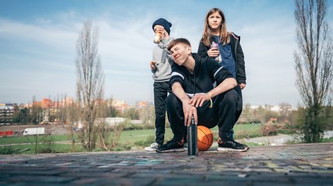 kids hang out in park with cans of paint - graffiti