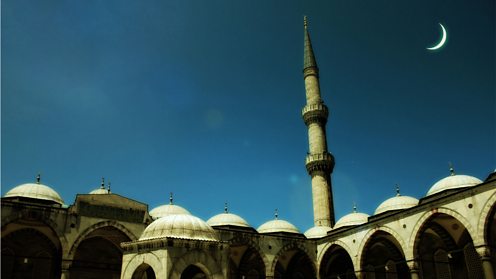 Welcome Ramadan - new moon over a mosque