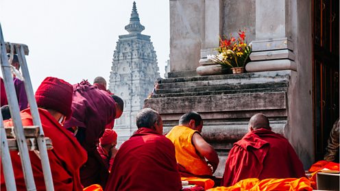 Buddhist monks praying at Mahabodhi temple, Bodhgaya