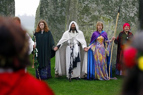 Druids performing a Samhain style blessing at Stonehenge, Wiltshire