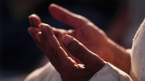 Hands of Muslim man praying