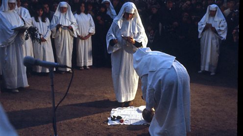 Druids' sunrise service at Stonehenge, Wiltshire at Spring Equinox