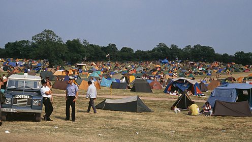 Two police officers on the Glastonbury festival site in 1989