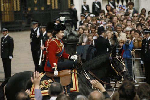 Queen riding down Pall Mall