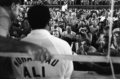 Ali in front of reporters
