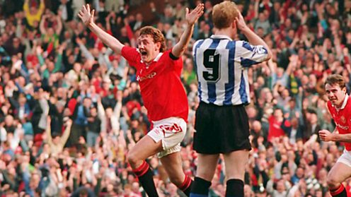 Steve Bruce celebrates scoring the winner against Sheffield Wednesday in 1993.