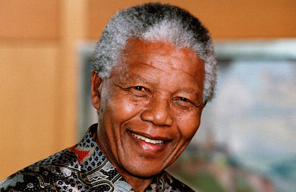Photograph of Nelson Mandela smiling.