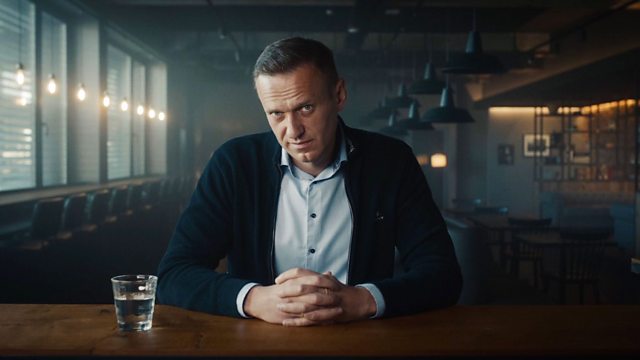 Image showing Alexei Navalny sitting in a bar