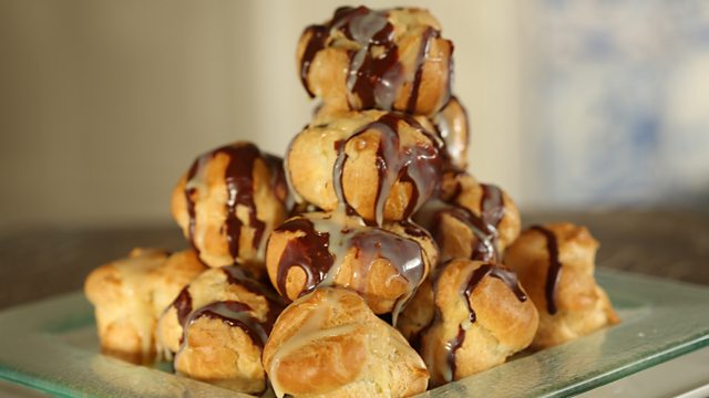 Profiteroles with two chocolate sauces-image