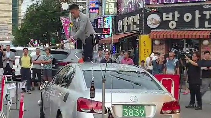 South Korean man smashes Japanese car in protest