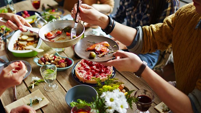 People eating together at the table