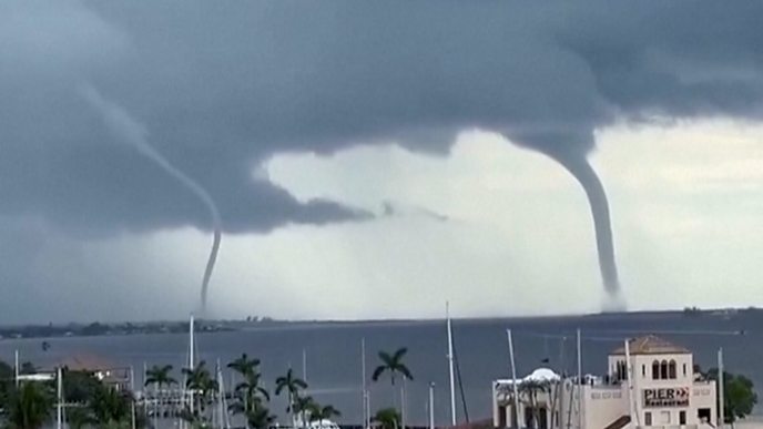Moment twin waterspouts are spotted over Florida river