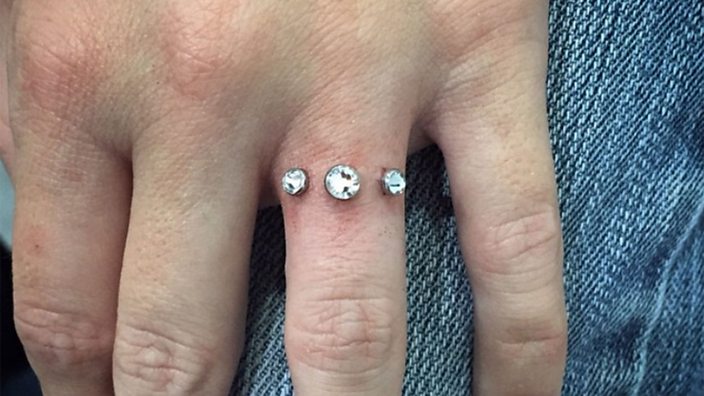 People are getting finger piercings instead of engagement rings