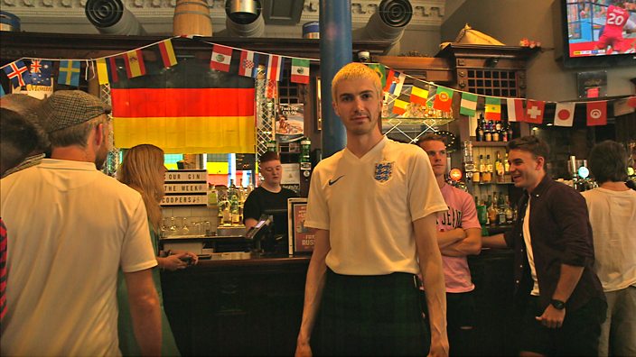 A man in an England shirt and kilt