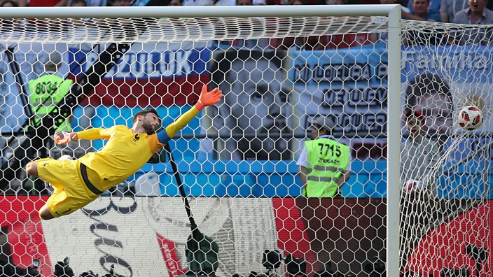 Hugo Lloris dives for Angel Di Maria&#39;s shot