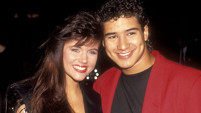 Tiffani Thiessen and Saved By The Bell co-star Mario Lopez pictured at a movie premiere in 1991