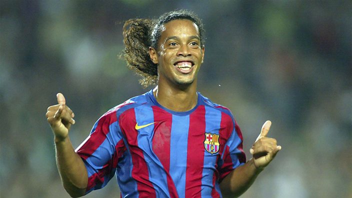 Brazilian Ronaldinho Gaucho celebrates after scoring a second