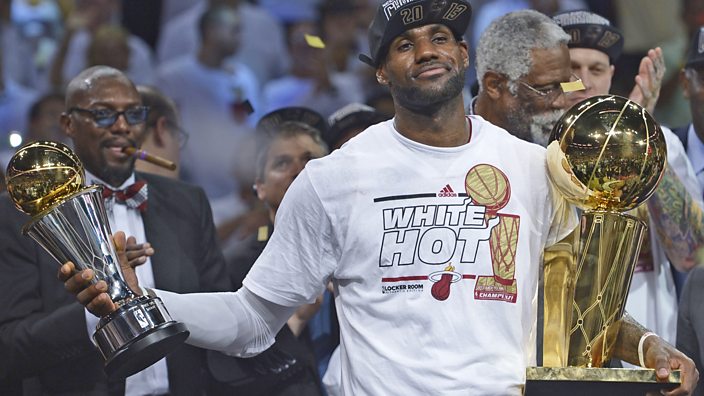LeBron with trophies