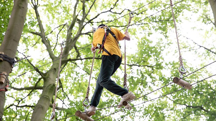 James on the tree top assault course at Yes We Can Youth Clinics