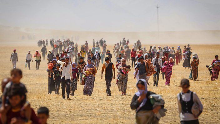 Yazidis trapped in the Sinjar mountains flee