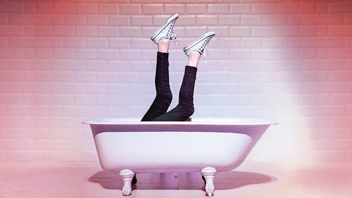 A woman's legs in a bath