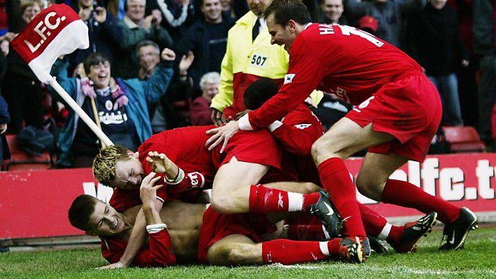 Gerrard is mobbed after his late winner against Charlton in 2003