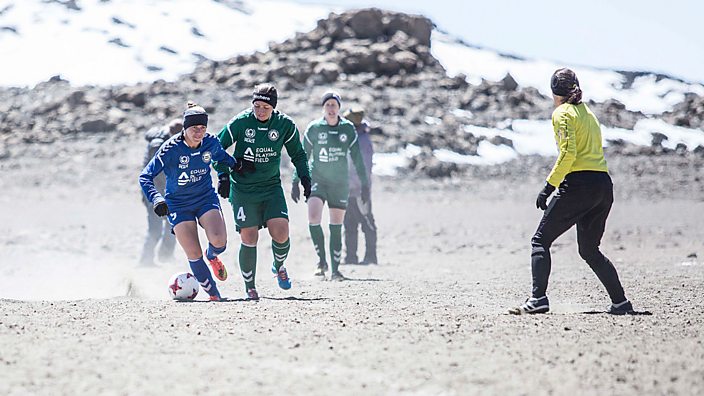 Footballers play on Mount Kilimanjaro