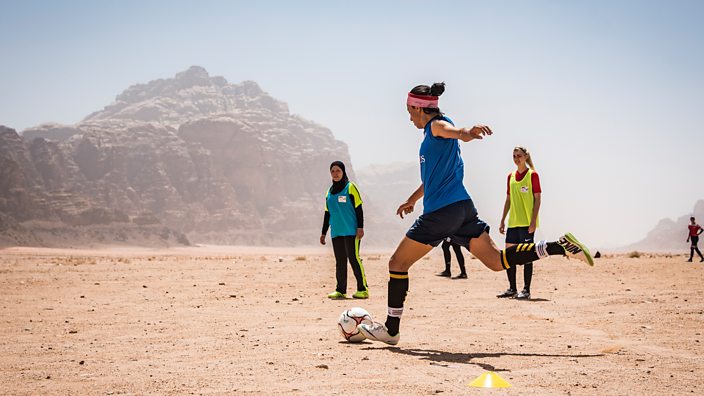 Women play football near Dead Sea