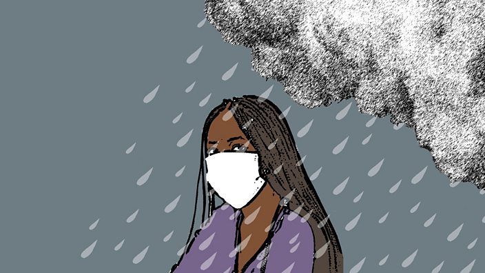 A young woman wearing a face mask under a rainy cloud